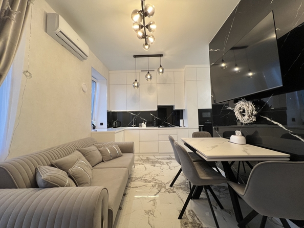 
   Продам 2-комнатную, 50.3 м², Строителей ул, 10/6

. Фото 3.